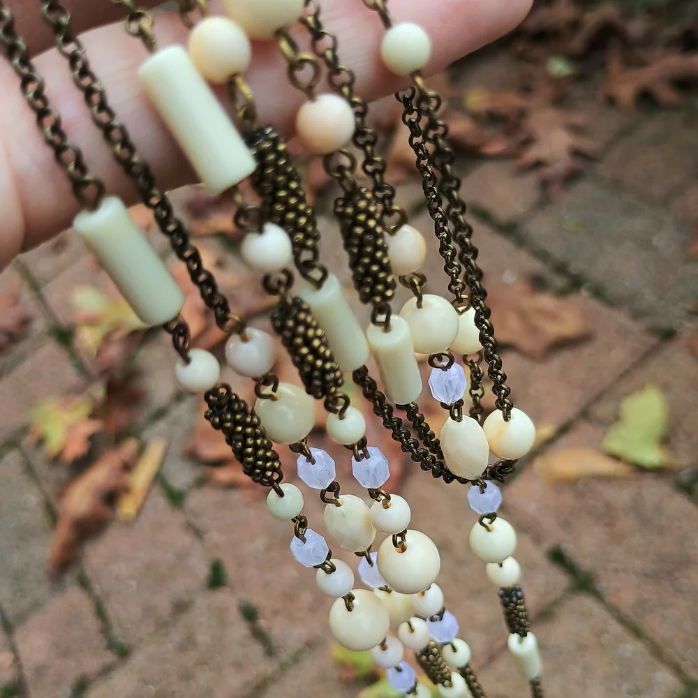 Gorgeous, art deco style, opera length, celluloid, lucite rope necklace, deco